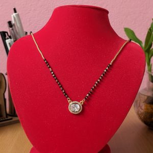 Infinity Stone Mangalsutra with a large sparkling white stone and black beads